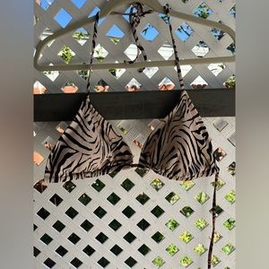 Tiger print swimming top. size: XL. Color: Black and beige